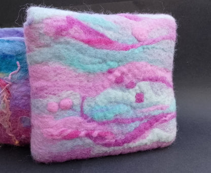 Teal and pink clutch purse